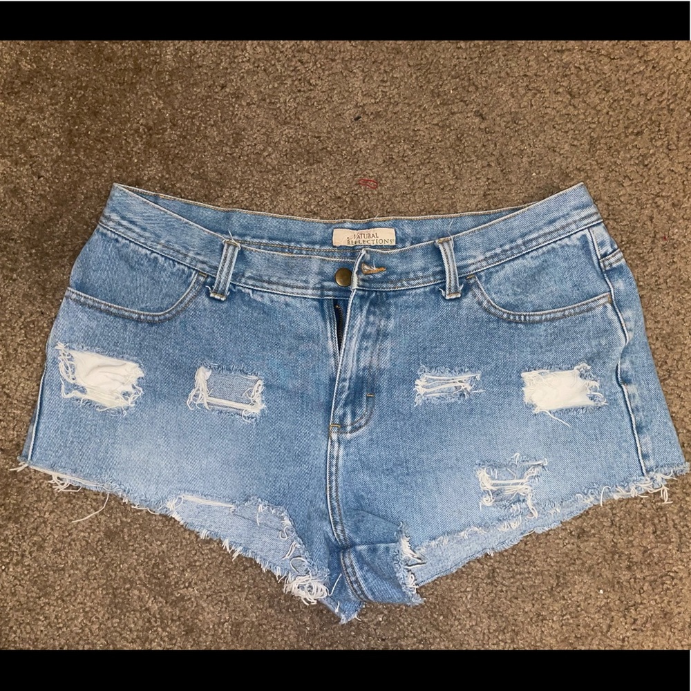 Distressed denim shorts